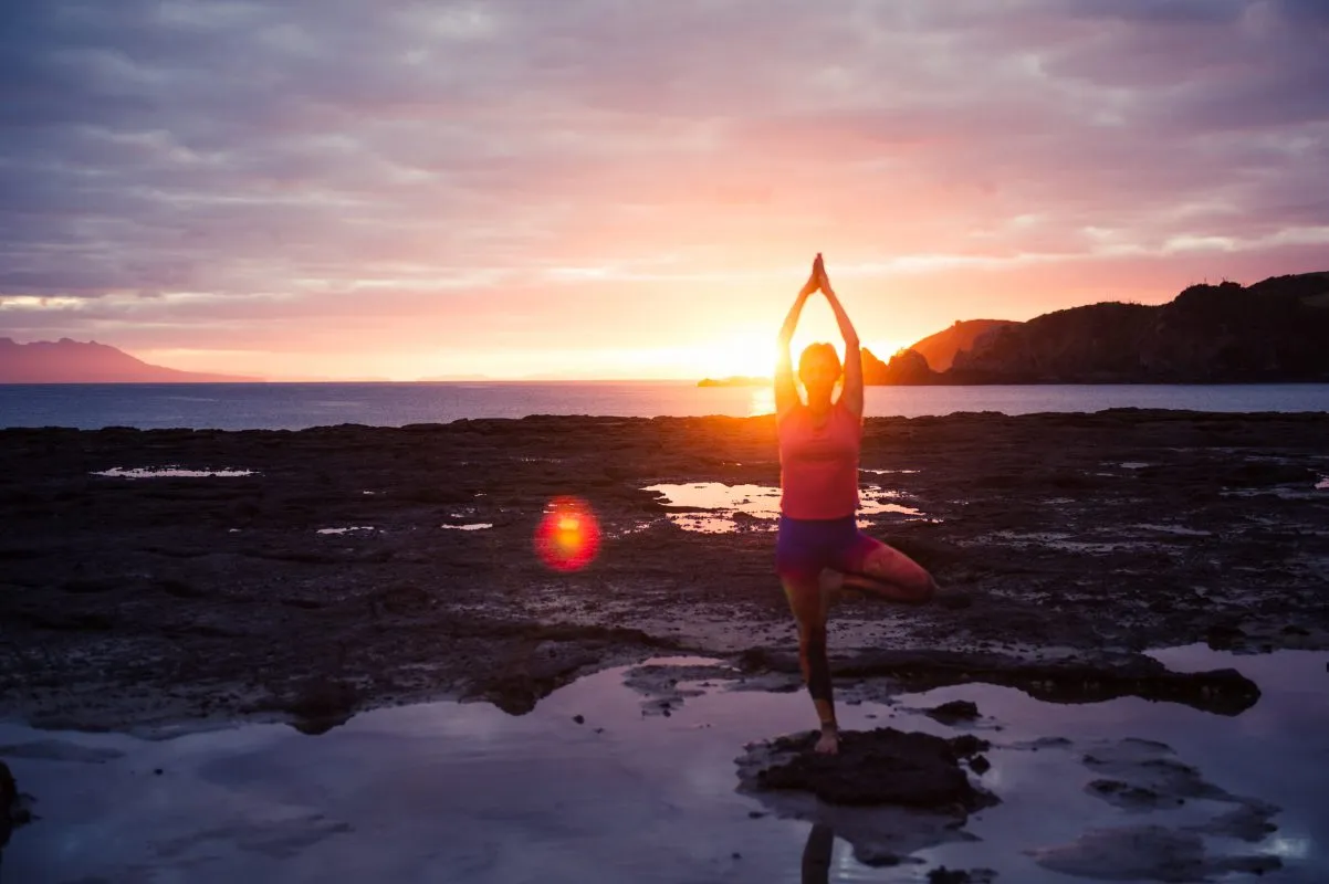 Sunrise photoshoot at the beach with Ingrid Yoga by lolamedia.co.nz